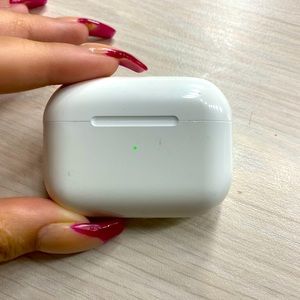 AirPods Pro case and right airpod.
